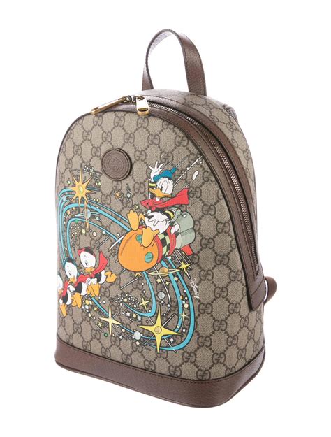 gucci x disney donald duck backpack|donald duck gucci bag.